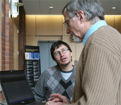 Paul Blair and student demonstrating the device