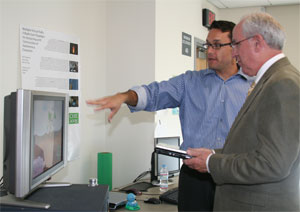 Bill Tomlinson demonstrates Eco-Raft to Rep. Harman