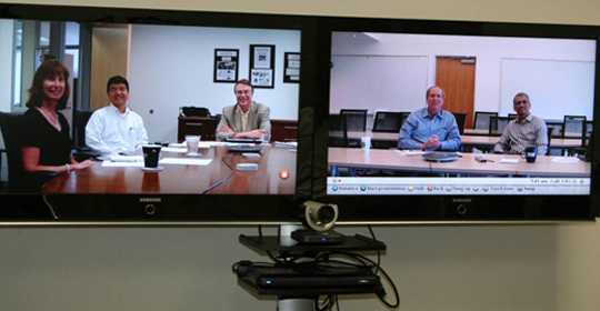 People participate in a LifeSize videoconference