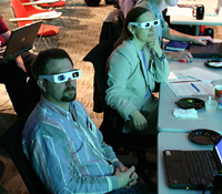 Researchers watch a 3D earth-sciences animation in the SDSC/Calit2 Synthesis Center