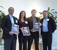 Ramesh Rao (left) and colleagues accept awards for UCSD Calit2 project