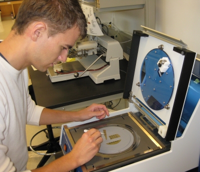 Michael Clark working with nanofabricated sample