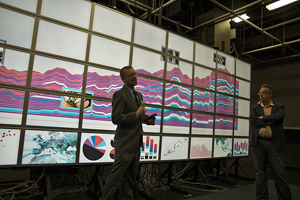 Jeremy Douglass, a Calit2-affiliated post-doctoral researcher, demonstrates cultural data visualization techniques at UC Irvine's HASTAC.