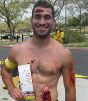 Disaster drill victim with mock wounds