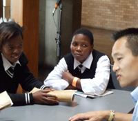 Albert Lin (right) with students at Scifest Africa