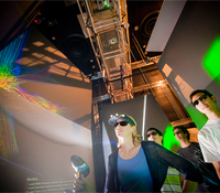MAE professor Alison Marsden views computer simulations in Calit2 StarCAVE VR environment.