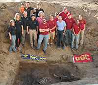 Teams from UCSD and USC at the gravesite of Native Diver