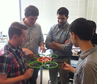Students from Printable Robotics Class holding drone