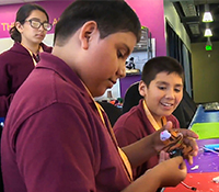 Children work with a microprocessor at the Thinkabit lab