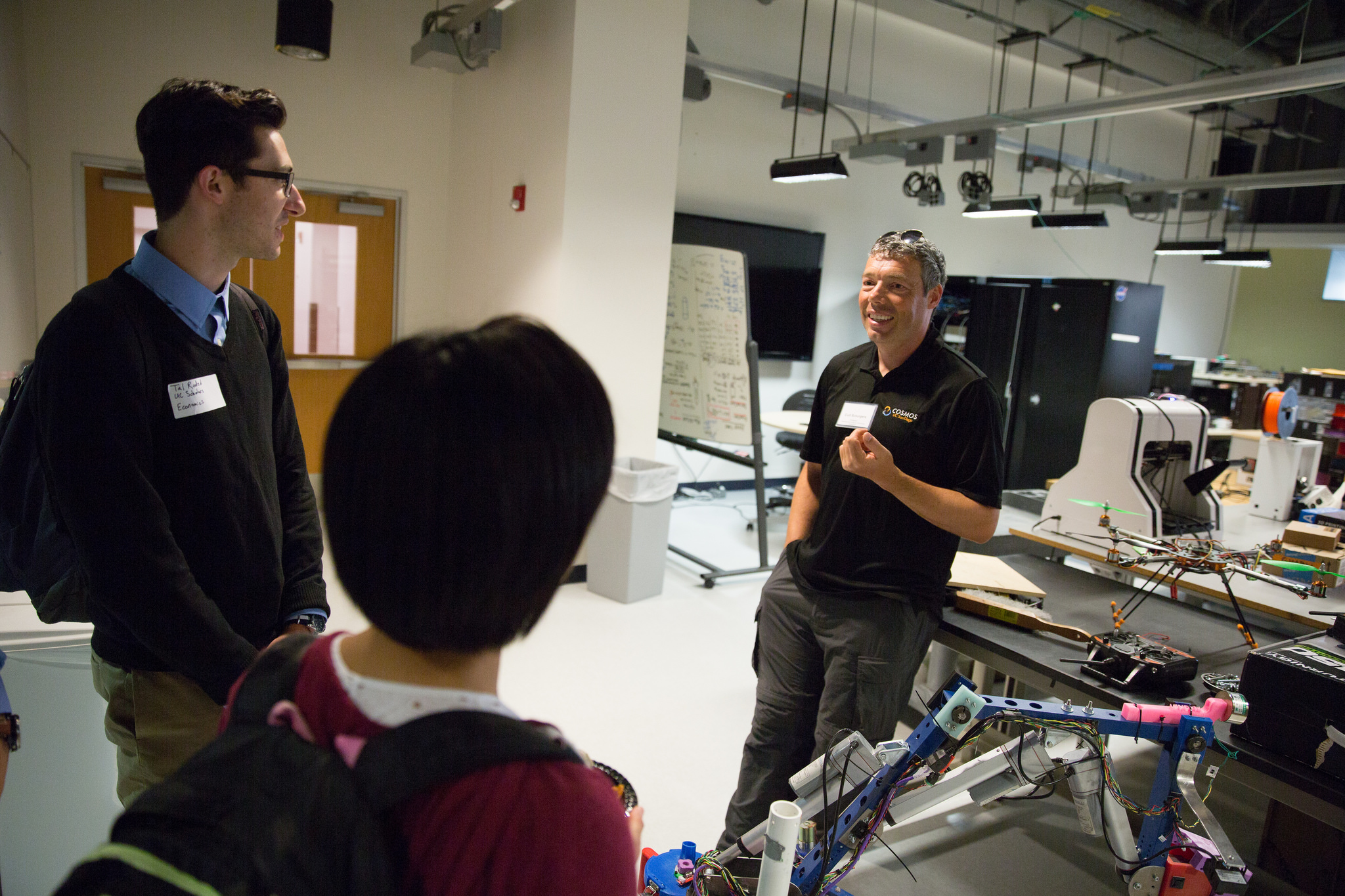 Curt Schurgers answers questions from students during a tour of the QI Prototyping Lab