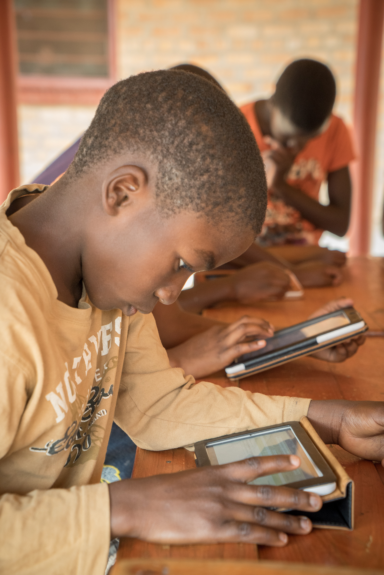 Prosper, 11years old, interacting with KA Lite on a tablet, in Zambia.