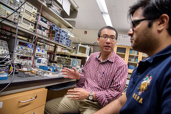 QI Circuits Lab manager Vincent Leung (center) will support UC San Diego and Brown researchers on th