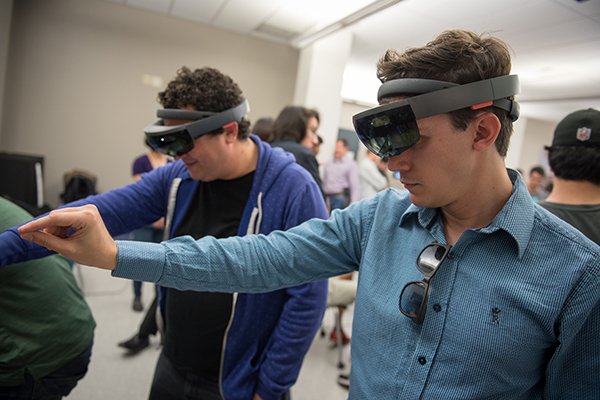 Using head-mounted display during open house for newly-finished Virtual Reality Lab in CSE.