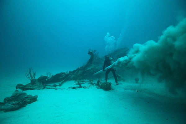 A diver investigates the Mary Celestia, a shipwreck off the coast of Bermuda. 