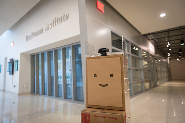 BoxBot stands in the lobby of the Qualcomm Institute