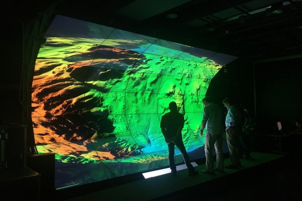 Researchers looking at WAVE visualization display